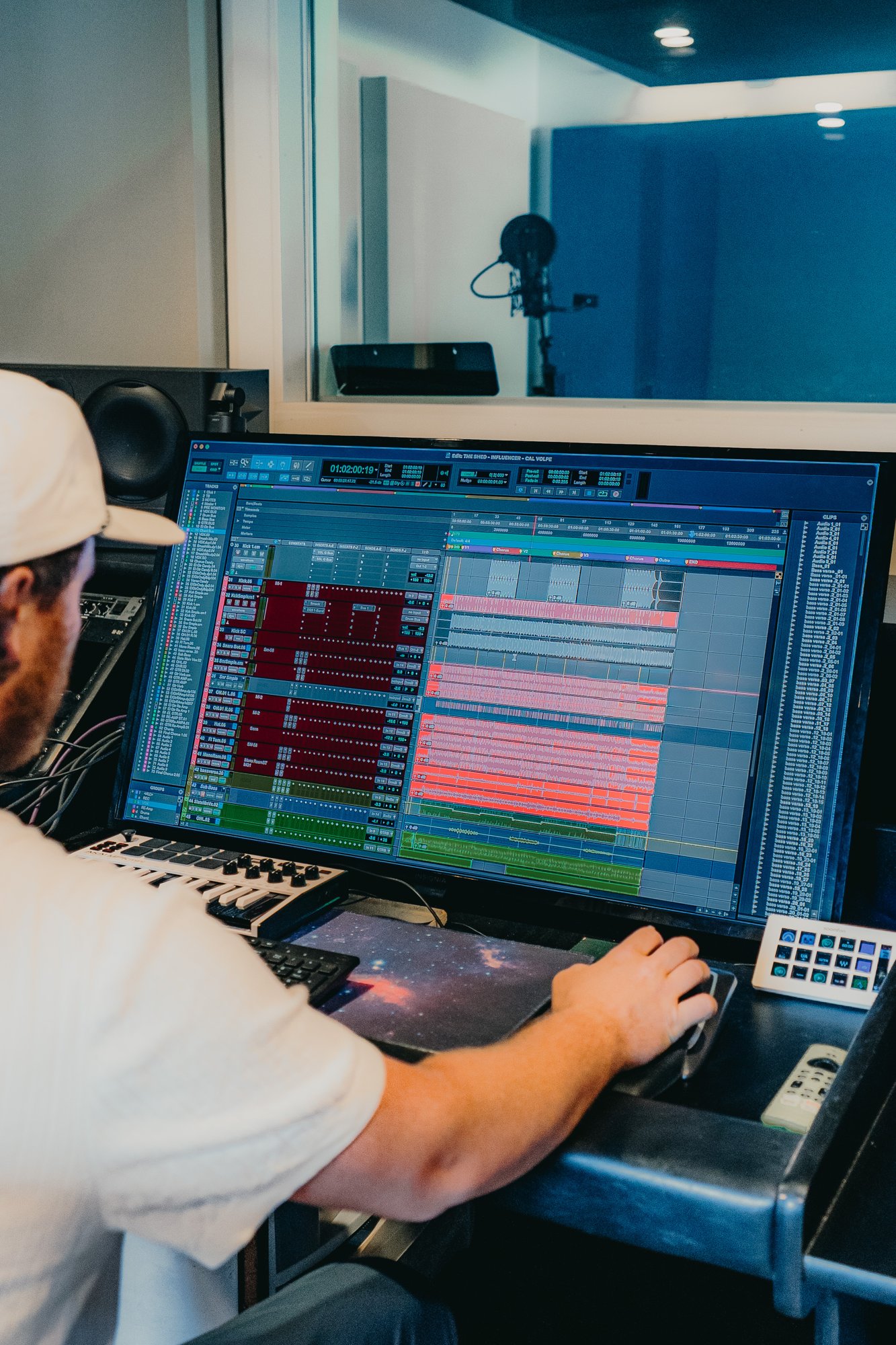 Audio engineer working at the recording workstation